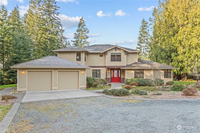 view of front of property with a garage