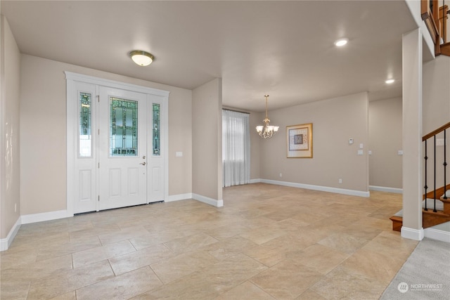 entryway with a notable chandelier