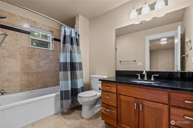 full bathroom featuring shower / tub combo with curtain, vanity, and toilet