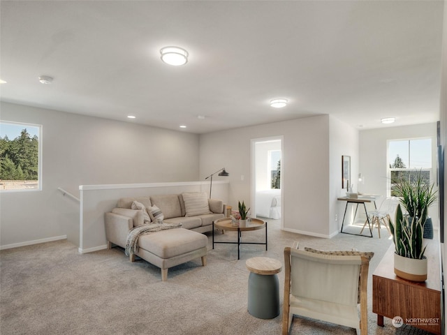 living room with light colored carpet