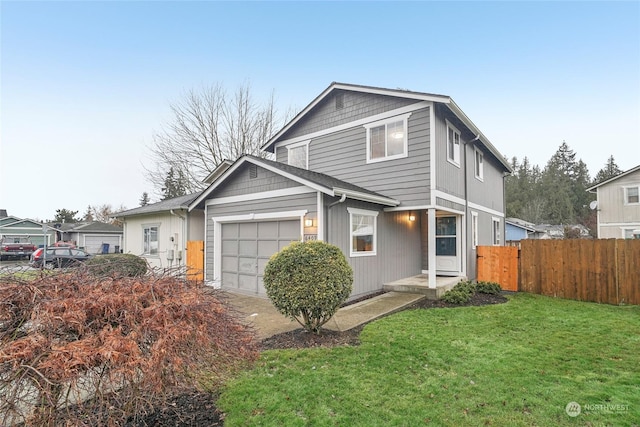 view of front facade with a garage and a front yard