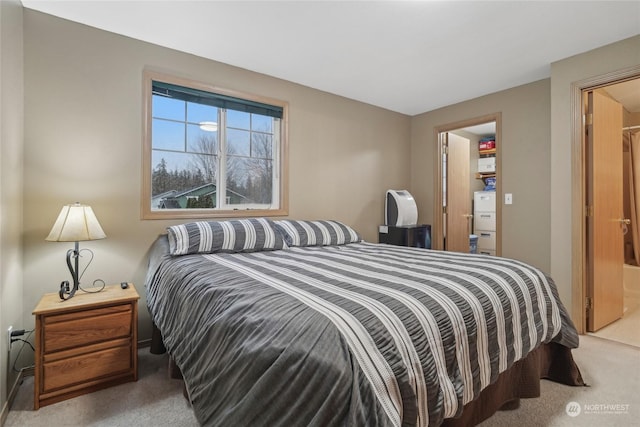 bedroom with light colored carpet