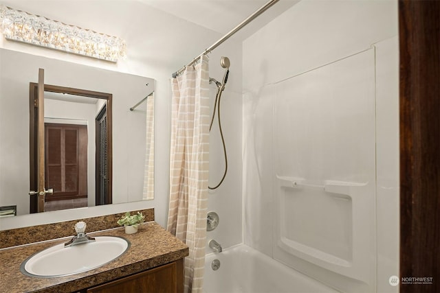 bathroom with vanity and shower / tub combo