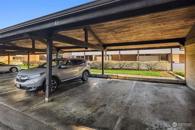 view of car parking featuring a carport