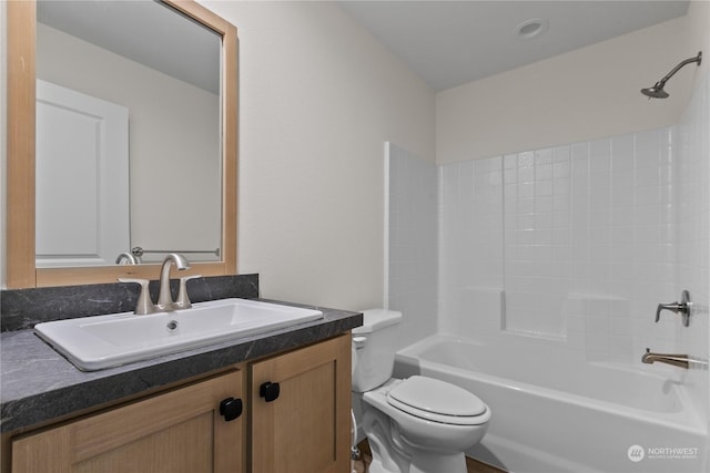 full bathroom with vanity, shower / bathing tub combination, and toilet