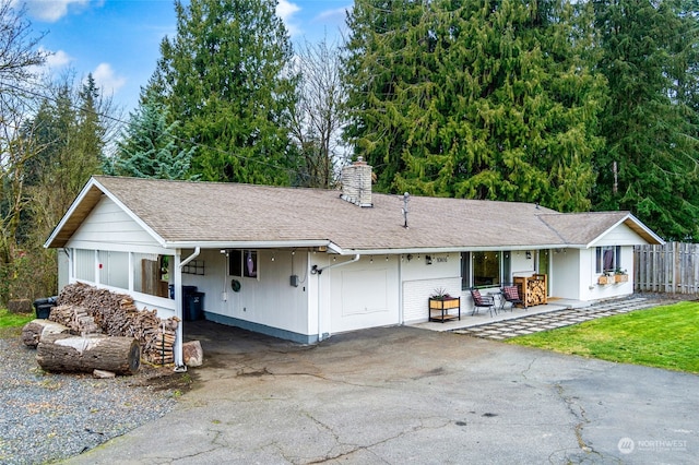 single story home featuring a garage