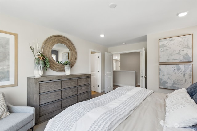 bedroom featuring recessed lighting