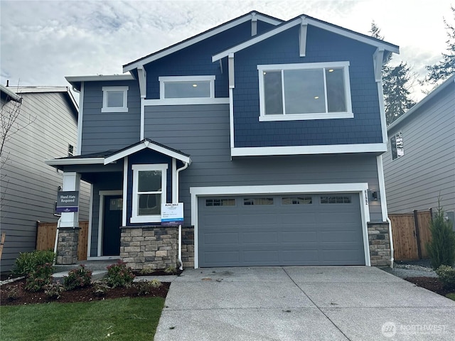 view of front of house with a garage and driveway