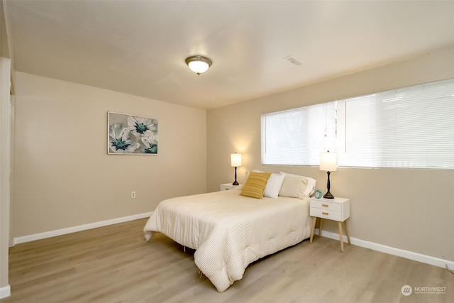 bedroom featuring light hardwood / wood-style flooring