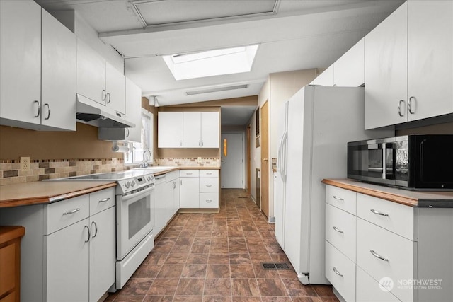 kitchen featuring backsplash, white electric range, sink, and white cabinets