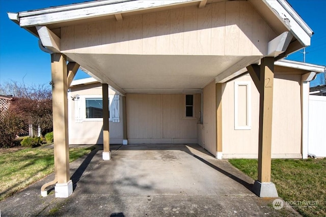 exterior space featuring a carport