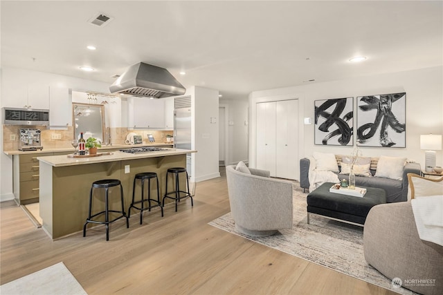 living room with light hardwood / wood-style floors