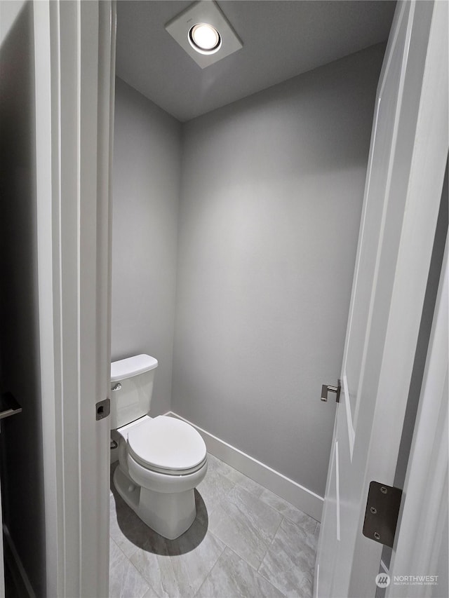 bathroom featuring toilet