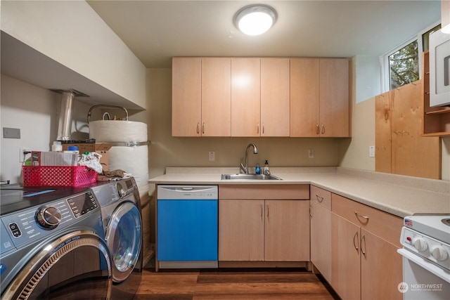 kitchen with sink, white appliances, washer and dryer, and light brown cabinets