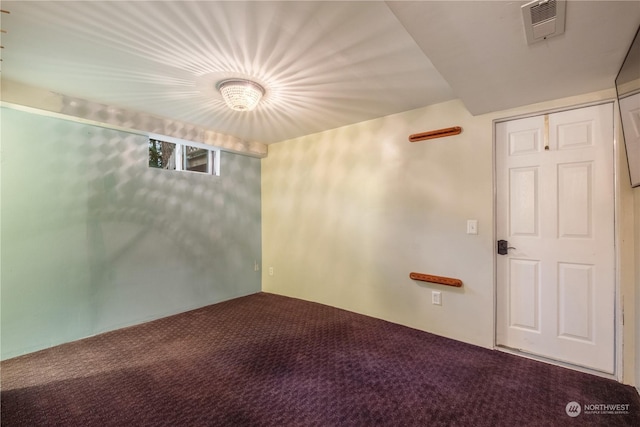 unfurnished room with carpet