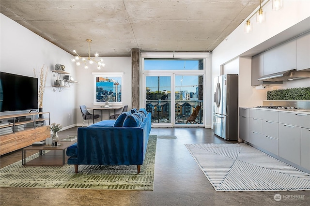 living room with a notable chandelier