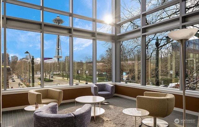 sunroom / solarium featuring plenty of natural light