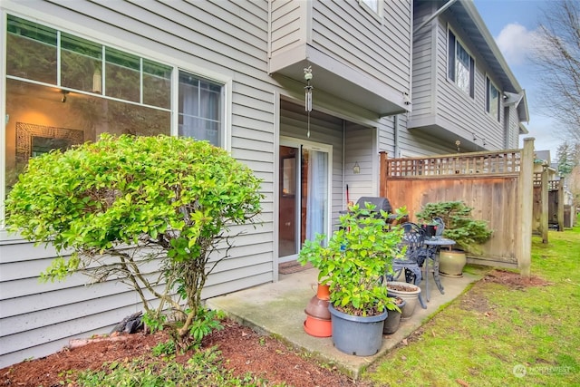 property entrance with a patio