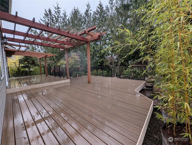 wooden terrace featuring a pergola