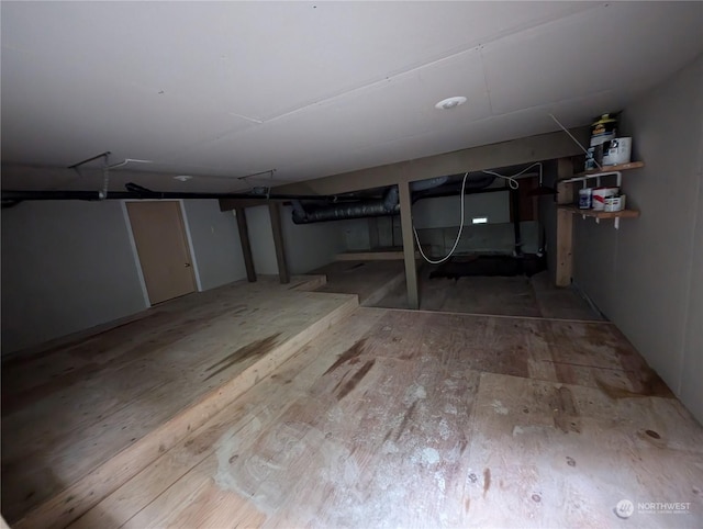 basement with wood-type flooring