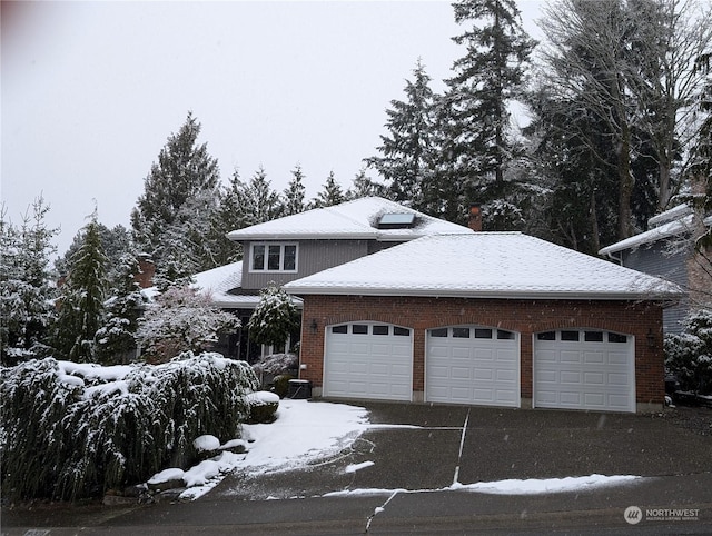 front of property with a garage