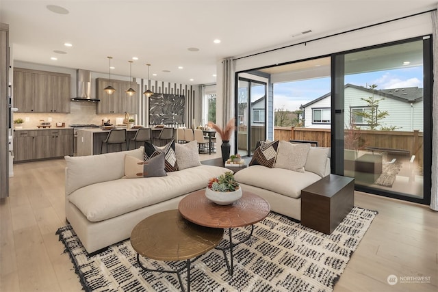 living room featuring light wood-type flooring