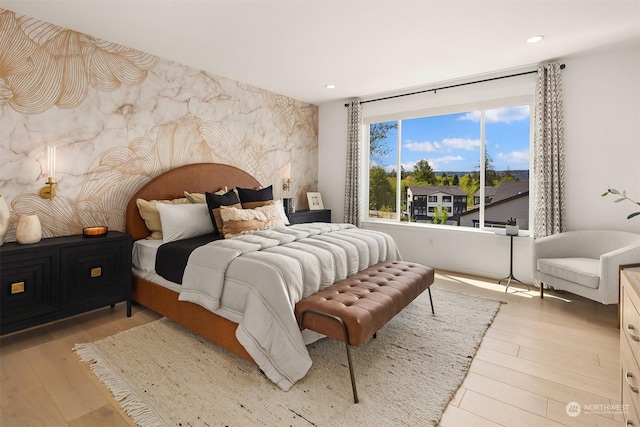 bedroom featuring light hardwood / wood-style flooring