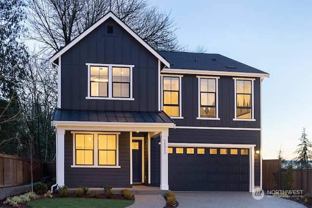 view of front of property with a garage