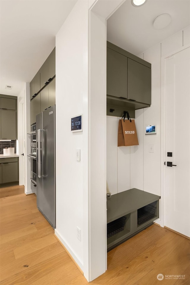 mudroom featuring light wood-type flooring