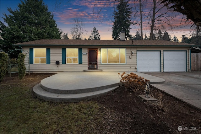 single story home featuring a garage