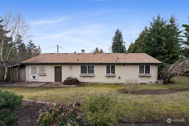 back of house featuring a yard and a patio area