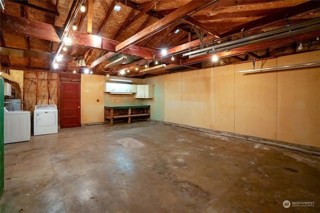 basement featuring separate washer and dryer