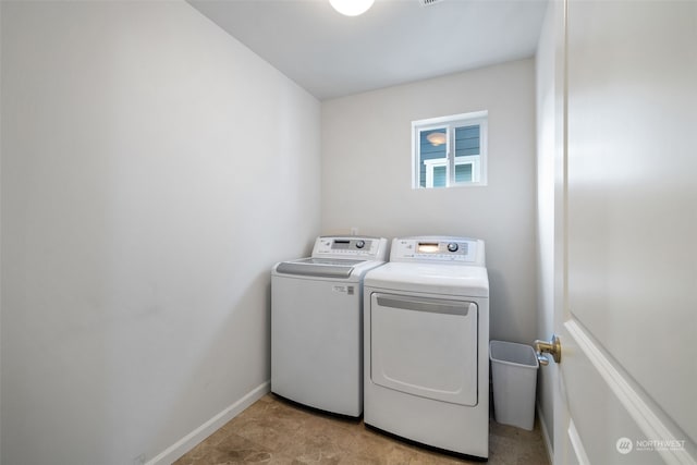 laundry room with washer and clothes dryer