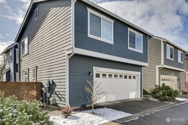 view of property exterior featuring a garage