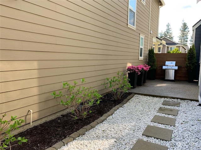 view of property exterior featuring a patio