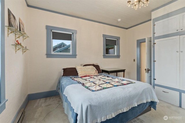 bedroom featuring light carpet and a chandelier