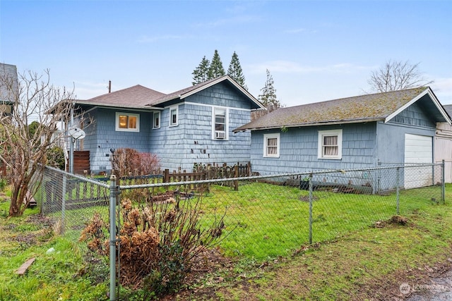 view of side of home featuring a yard