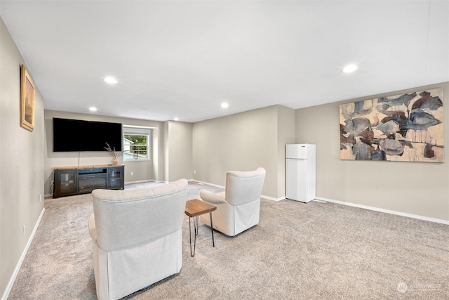 living room featuring light carpet