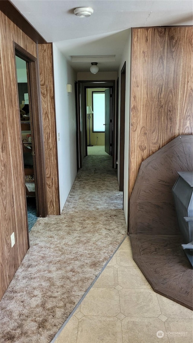 hallway featuring carpet