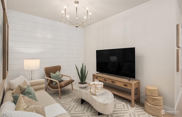 living room with a notable chandelier