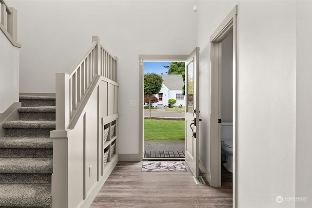 foyer entrance with hardwood / wood-style flooring