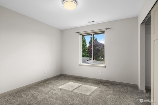 unfurnished bedroom with carpet