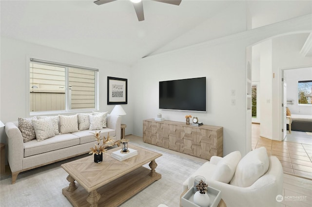 living room featuring lofted ceiling and ceiling fan