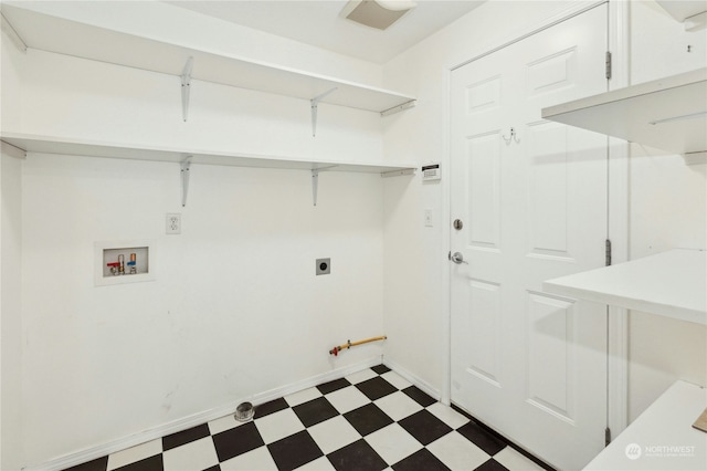 laundry area featuring hookup for a washing machine, gas dryer hookup, and hookup for an electric dryer