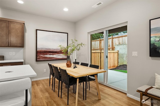 dining area featuring light hardwood / wood-style flooring