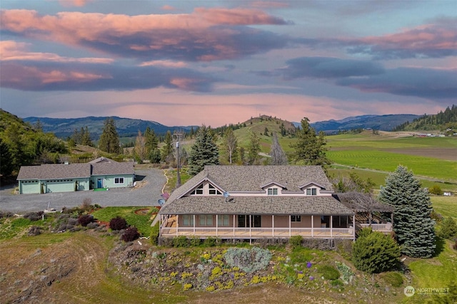 exterior space featuring a mountain view