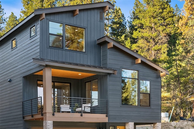 view of property exterior featuring a balcony