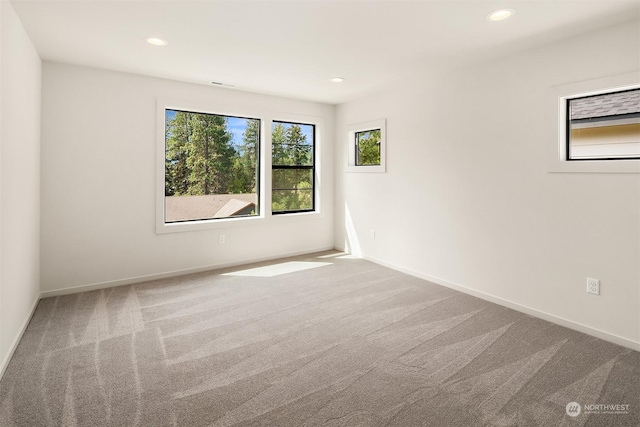 view of carpeted spare room