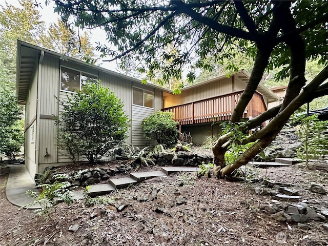 exterior space featuring a wooden deck