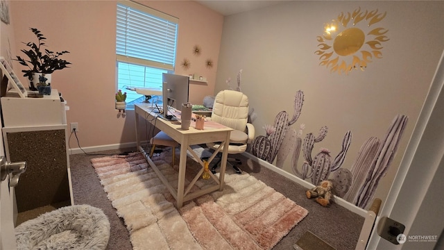 carpeted office with baseboards